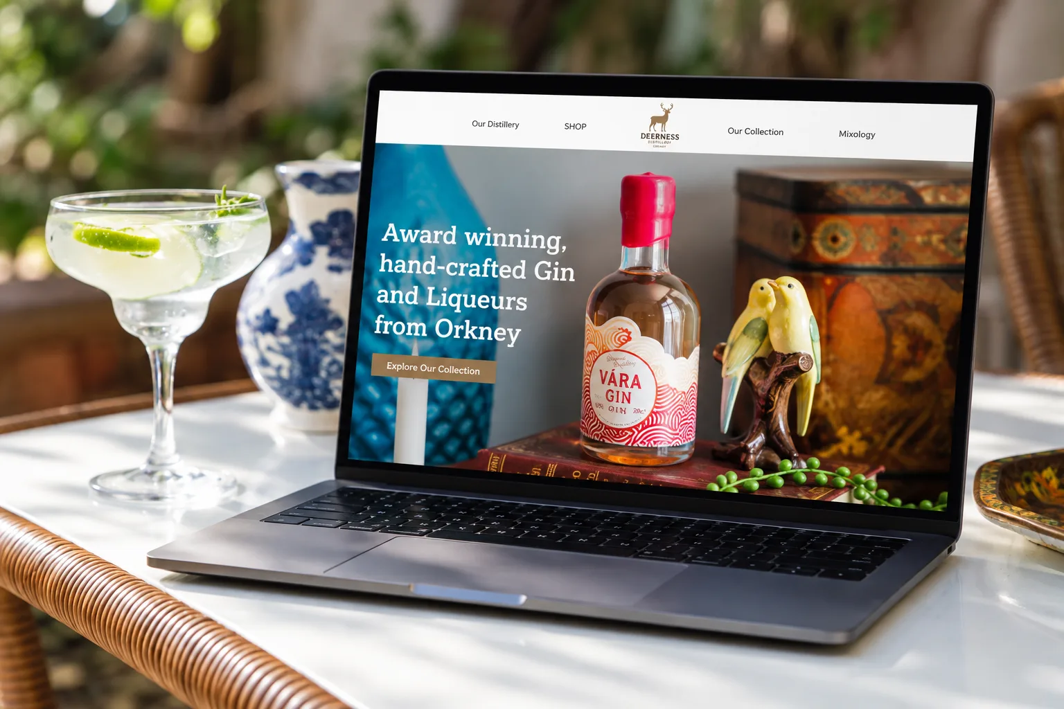 Deerness Distillery website on a laptop